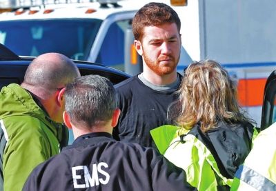 嫌犯接受詢問。新華社/美聯(lián)