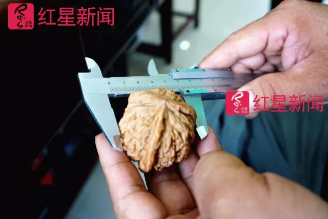 文玩核桃遇冷由幾萬(wàn)一對(duì)降到5元沒(méi)人要？商戶否認(rèn)