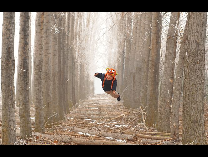 美國男子為患唐氏綜合癥兒子拍“飛行照” 美國男子為患唐氏綜合癥兒子拍“飛行照”