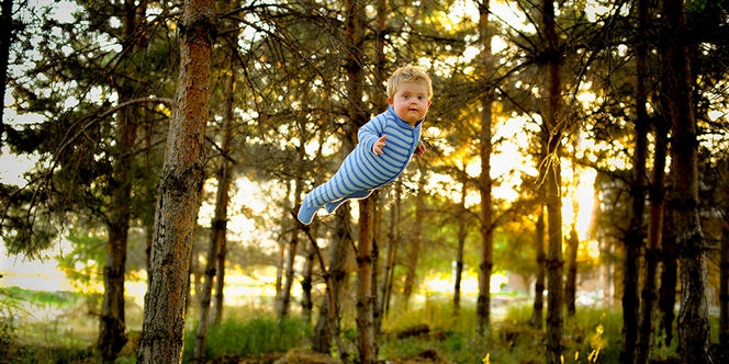 美國男子為患唐氏綜合癥兒子拍“飛行照” 美國男子為患唐氏綜合癥兒子拍“飛行照”