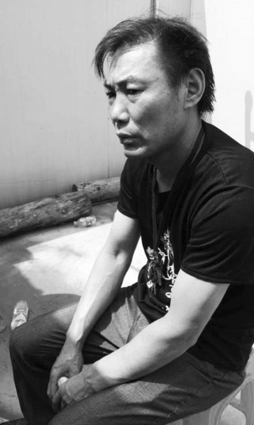 拉板車救人的鄒命東