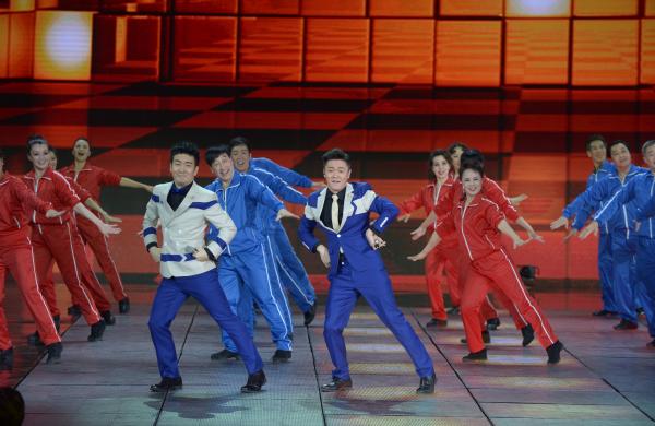 《小蘋果》、《最炫民族風(fēng)》等廣場(chǎng)舞曲將會(huì)有全國統(tǒng)一、編排科學(xué)、帶給人正能量的全新動(dòng)作。 CFP 資料